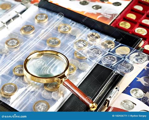 Numismatic Coins with Magnifying Glass Stock Image - Image of currency ...