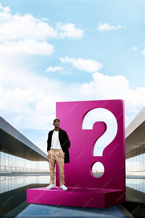 Premium Photo | Full shot man posing with question mark