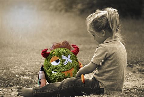 Little Girl and monster toy in monochrome free image download