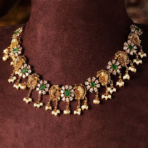 Fish Elegance Floral Pattern Gold Plated Green Stoned Necklace Jhumkis ...