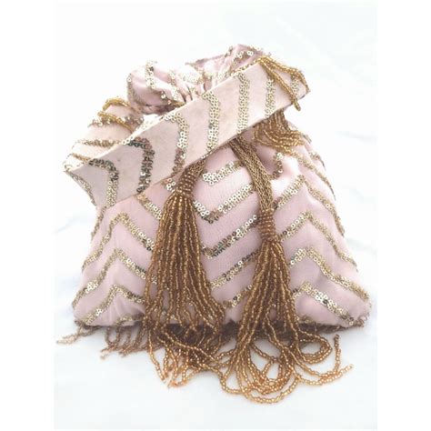 Buy A Clutch Story Lively zigzag Potli Online