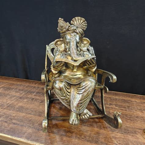 Brass Ganesha Statue Reading Book On Rocking Chair 2 Feet – StatueStudio