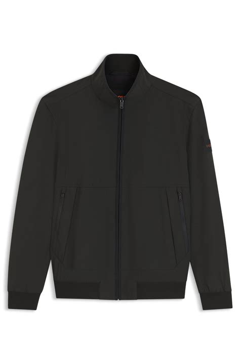 BOSS - Water-repellent softshell jacket with detachable sleeves - Black