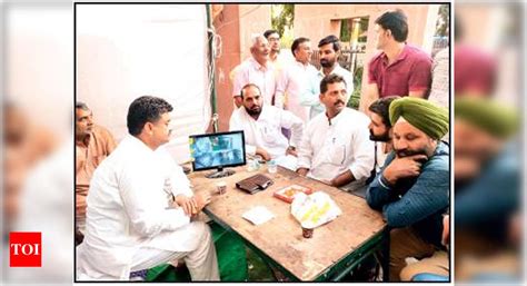 AAP's Sharma, Chander Mohan 'guard' EVMs at Panchkula government ...