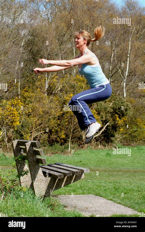 Image result for Woman Jumping Over Bench
