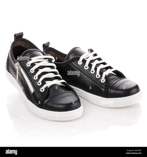 Black shoes with white laces isolated on white Stock Photo - Alamy