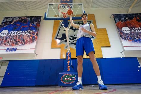 Florida's 7-foot-9-inch player Olivier Rioux doesn't need ladder to cut ...