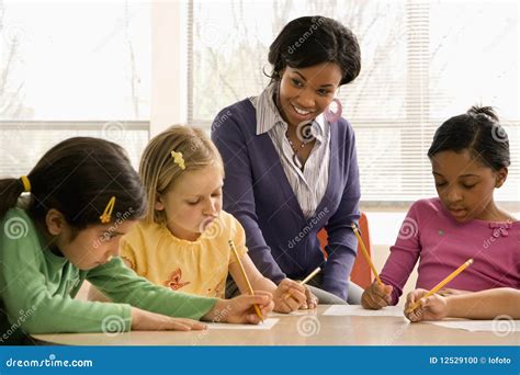 Indian Teacher Teaching Kids
