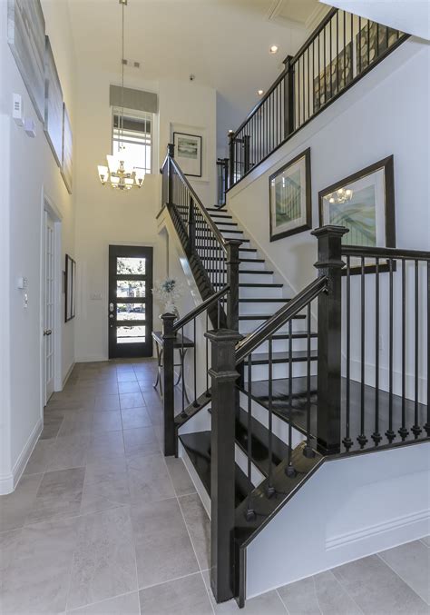 Gehan Homes Stairway - Black Hardwood Tread, White Risers, L-Shaped ...
