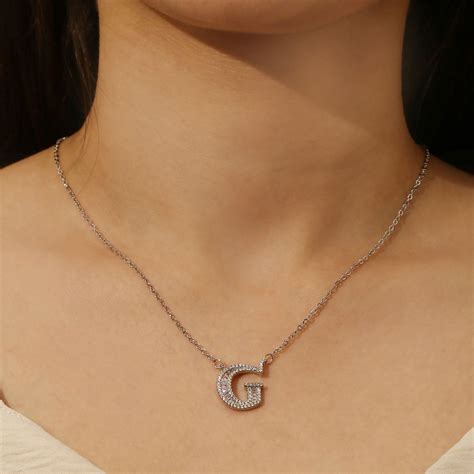 Buy Pipa Bella by Nykaa Fashion Silver Clear Crystal Studded G Initial ...