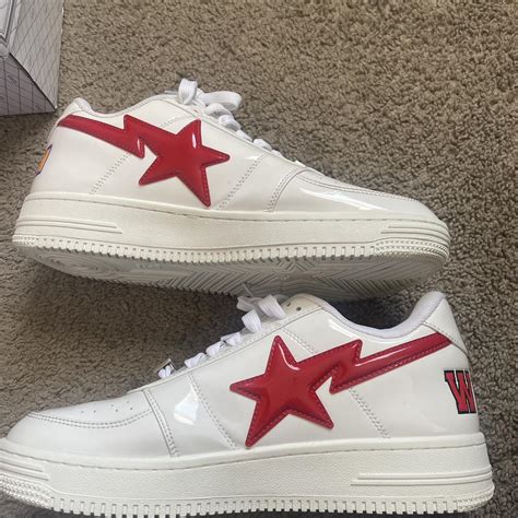 Used white shark bapestas. - Depop