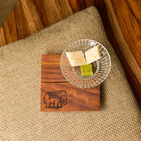 Buy ExclusiveLane 'The Elephant Warriors' Hand Carved Trivet in ...