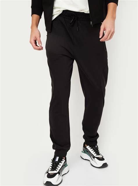 Buy Men Solid Athleisure Joggers Online at just Rs. 1199.0 ...