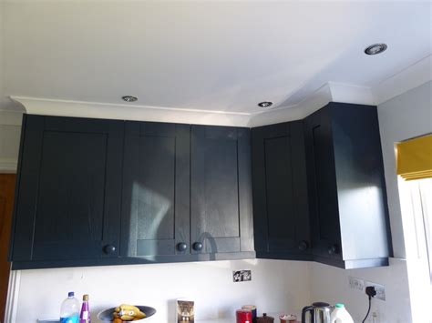 How to Fill the Space Above Kitchen Cabinets