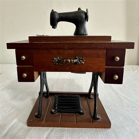 Image result for Sewing Machine Music Box Scam