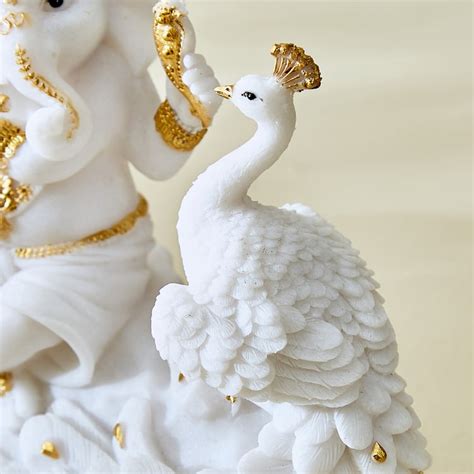 Buy Dhayana Mira Polyresin Ganesha with Peacock Figurine from Home ...