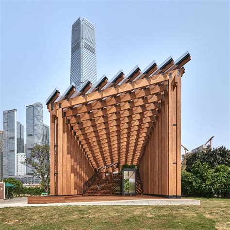 Timber pavilion unifies landscape and waterfront in West Kowloon ...