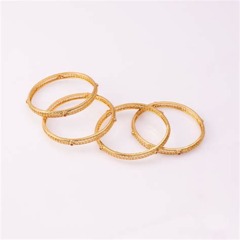 Buy Niscka Ethnic 24K Gold Plated Pink Stone Bangles Online