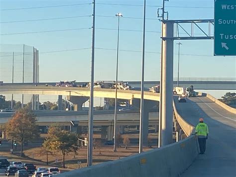 Ramp closed after 18-wheeler overturns on expressway connecting to I-59S