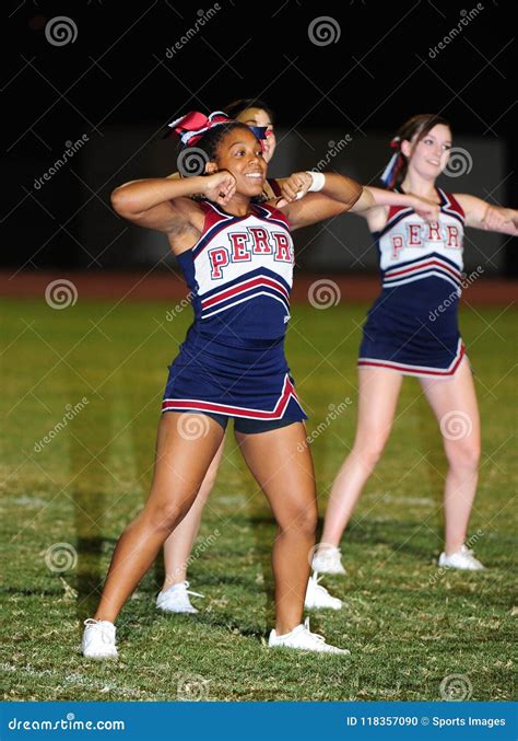High School Cheerleaders Cheering