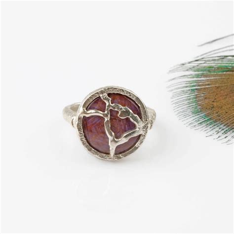 Radiant star ruby silver reticulated ring
