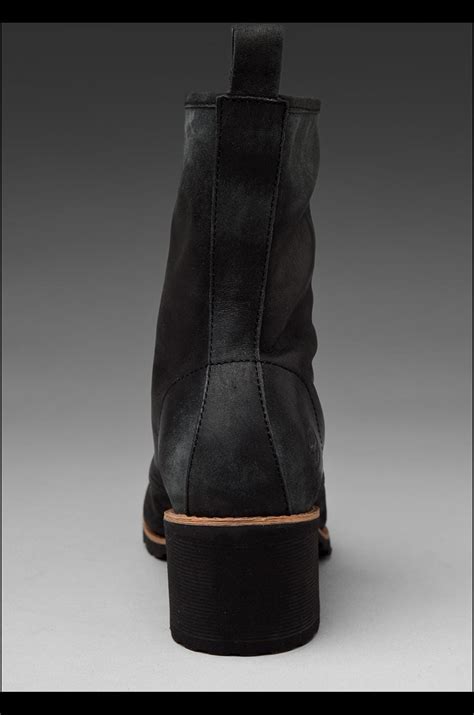 Dr. Martens Lucie 9 Tie Boot in Black | REVOLVE