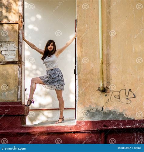 Girl in arch stock image. Image of brunette, looking - 33662467