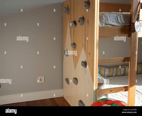 Montessori children's room with bunk bed and climbing wall Stock Photo ...