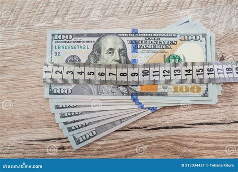 Dollar Bills and Tape Measure Stock Image - Image of credit, business: 213034421 - measurement of dollar bill