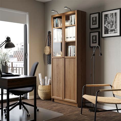 BILLY / OXBERG bookcase with panel/glass doors, brown walnut effect ...