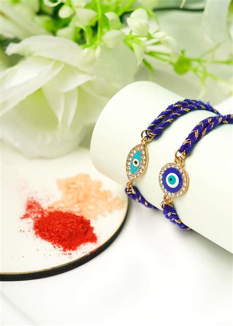 Get Sky Blue Evil Eye Rakhi - Set Of 2 at ₹ 429 | LBB Shop