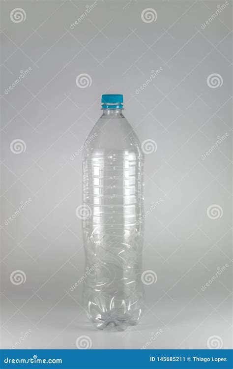 A Empty Bottle of a Liter and a Half of Mineral Water with Blue Cap and ...