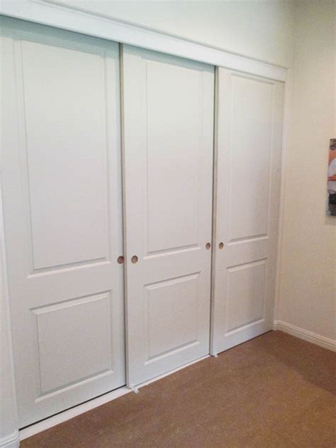 3-panel, 3-track Molded Panel Closet Doors are a popular choice among ...