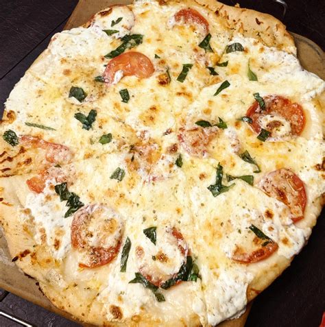 Chardonnay Garlic Butter Sauce, Mozzarella, Asiago, Parmesan, Tomato ...