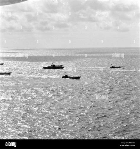 German mine sweeps and landing boats at sea Stock Photo - Alamy