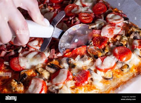 Image result for Someone Using Pizza Cutter