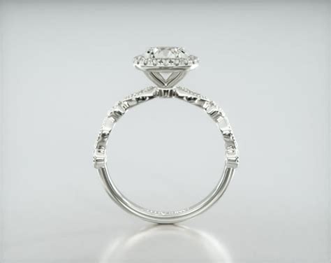 Round & Marquise Shape Diamond Engagement Ring Embellished With a ...