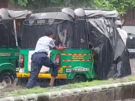 Water filled in the normal rain, rickshaws stopped on the road and it ...