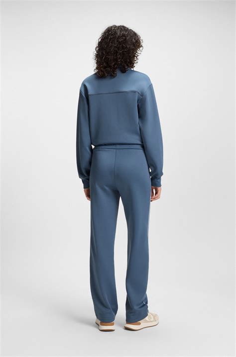 BOSS - Straight-fit tracksuit bottoms with contrast logo and piping - Blue