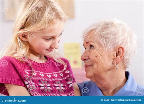 Grandma with granddaughter stock photo. Image of love - 36081822