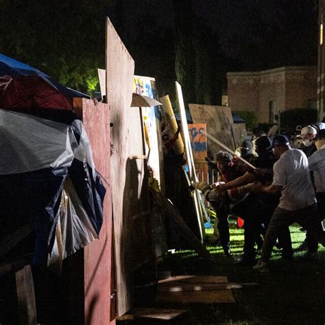 Members of law enforcement enter a Pro-Palestinian encampment at UCLA on May 2, 2024 in Los Angeles,