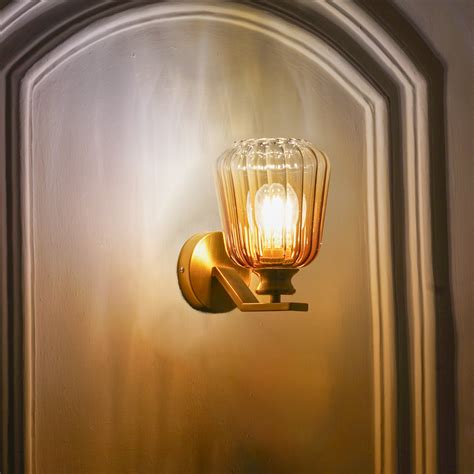 BRINLEY Single Light Wall Fitting In Brass Finish Metal With Amber Gla ...