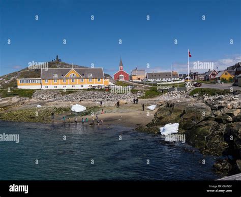 Children playing on beach in historic district Nuuk capital city of ...