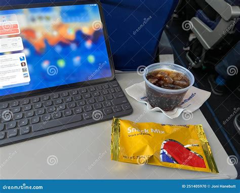 A Drink and Snack in Front of a Computer from a Flight on Southwest ...
