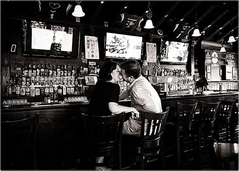 engagement photos in a bar
