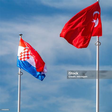 The National Flags Of Croatia And Turkiye Waving In The Blue Sky Stock Photo - Download Image ...