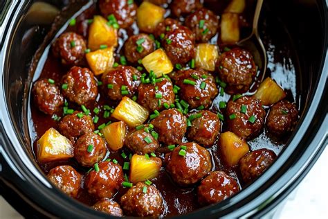 https://insanelygoodrecipes.com/wp-content/uploads/2025/01/Crockpot-Hawaiian-Meatballs-Featured.jpg