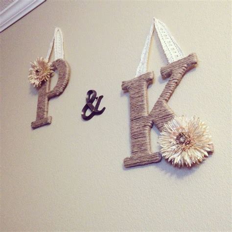 Plain wooden letters from Hobby Lobby, wrap in Jute, add your own ...
