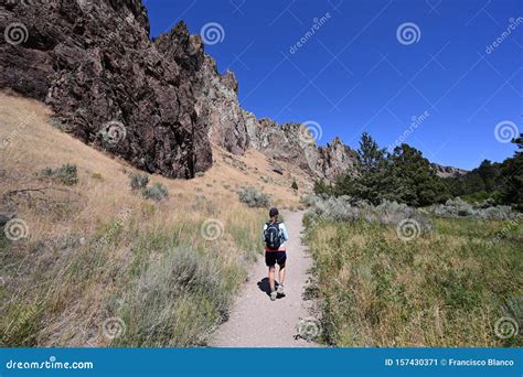 Woman on Misery Ridge Trail in Smith Rock State Park, Oregon. Stock ...