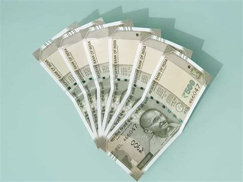 Rupee to trade near record lows despite surging growth | Zee Business